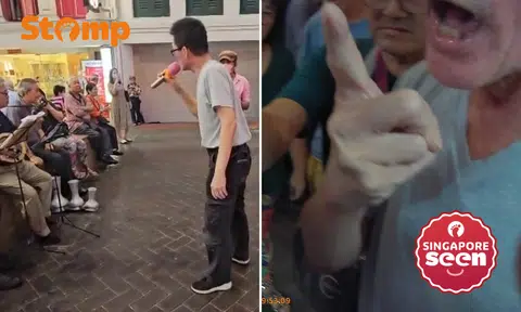 Controversial Chinatown singing group in heated confrontation with shop employee: 'Don't touch me!'