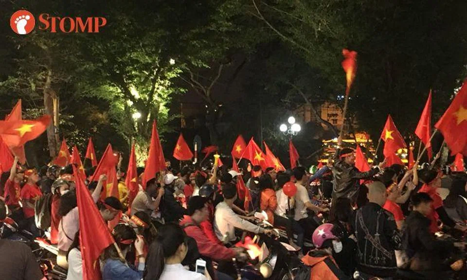 Vietnam's football fans take to the streets to celebrate victory over Qatar in AFC U23 Championship