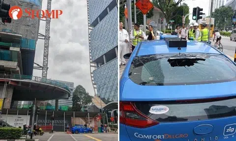 Concrete mix accidentally discharged onto road damages taxi next to Shaw Tower worksite