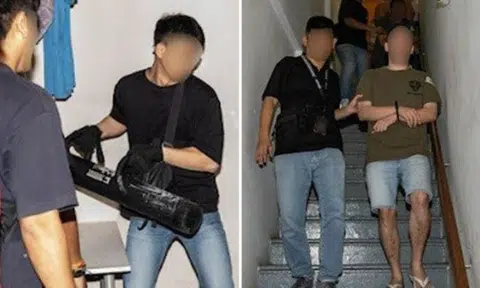 Officers from Bedok Police Division and the Immigration & Checkpoints Authority conducted an enforcement operation against illegal gambling activities in a unit at Lorong 30 Geylang on Dec 10. Photos: Singapore Police Force