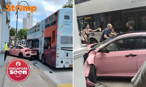 Pink Honda crashes into Rendezvous Hotel pillar after trying to overtake bus at Bras Basah Road