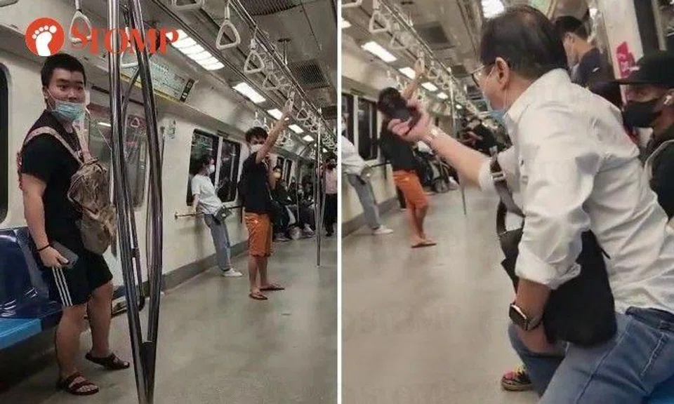An uncle was caught on camera quarrelling loudly in Mandarin with a younger man on a North-South line train, making the other passengers uncomfortable.