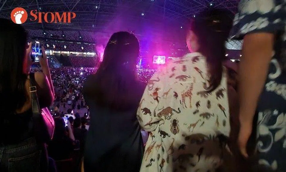 "Bruno Mars was great, but the whole concert experience was ruined by these self-entitled young Singaporean adults," said the Stomper, who shared a photo of the people standing in front of her.