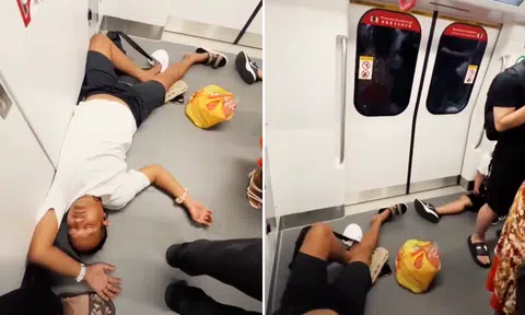 Sleeping MRT commuter sprawled on cabin floor caught on video: 'Taking power nap to a whole new level'