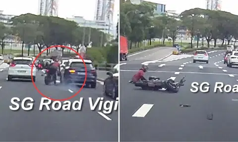 Motorcyclist tumbles across PIE after lane splitting, hitting rear of Audi: 'Ride like you own the road'