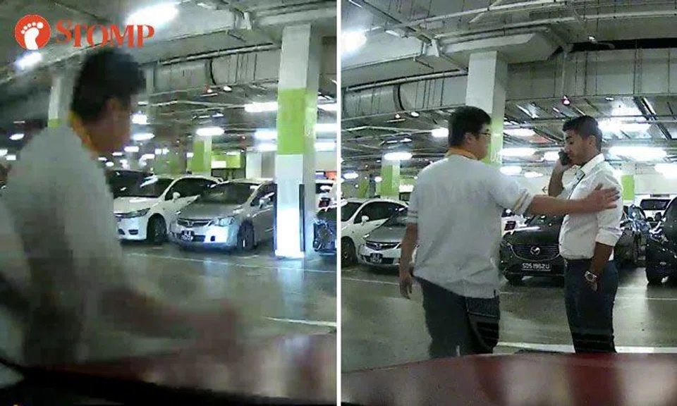 Guy punches bonnet of another driver's car at Changi City Point carpark