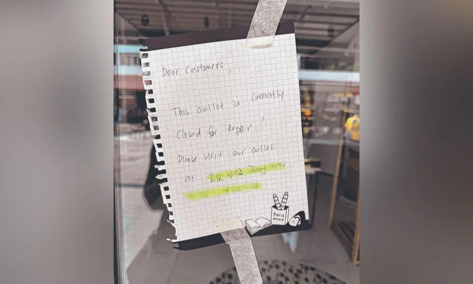 Notice outside hair salon announcing renovations