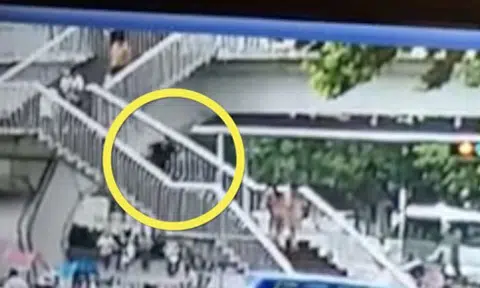 Woman in China falls down stairs to her death while using mobile phone
