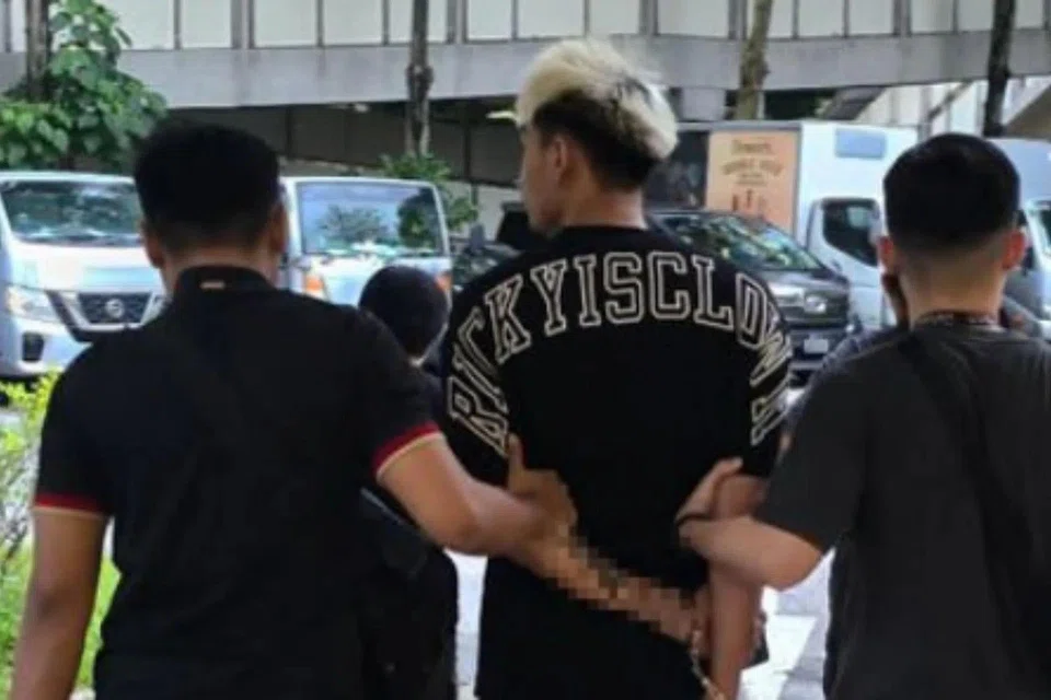 A suspected drug offender arrested by CNB officers in an island-wide drug operation from 7 to 11 April 2025.