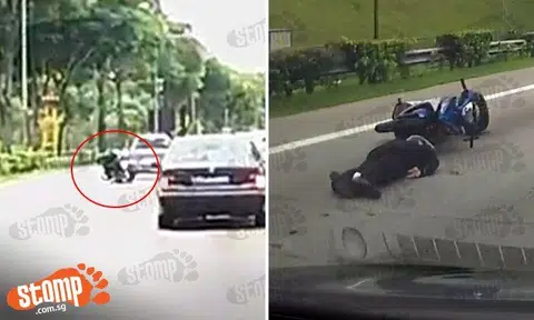 Motorcyclist sent 'flying' off bike after ramming into car that suddenly changed lanes on SLE