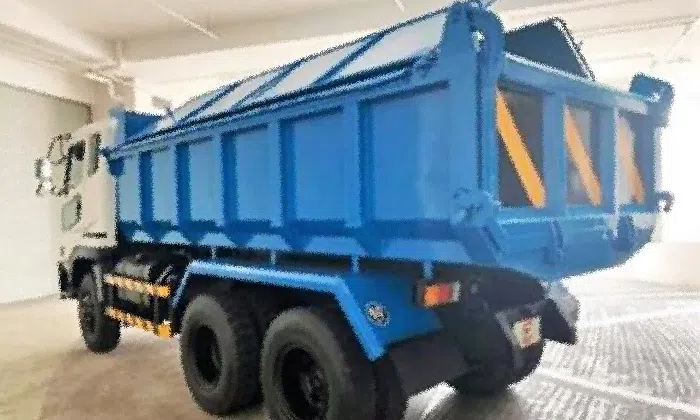 Construction worker dies after being run over by reversing dump truck ...