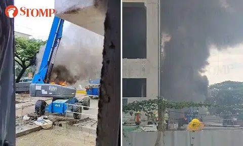 Plumes of smoke rise from Pioneer construction site after boom lift catches fire