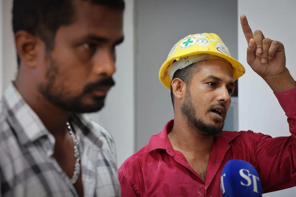 Construction workers Shakil Mohammad (right) and Ramesh Kumar helped to save some of the children from the shophouse fire on April 8.