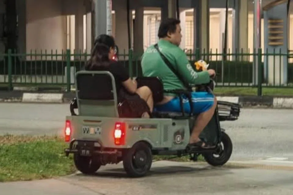 A couple was spotted in a two-seater PMA, raising questions about the legality of the device.