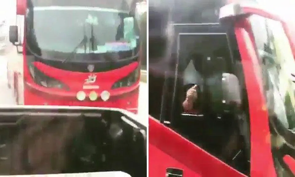 Malaysian bus driver swerves between lanes like lunatic trying to chase pickup after getting honked at