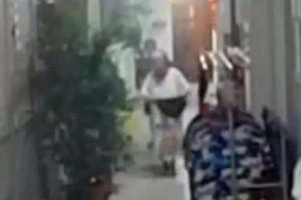 The woman danced, waving her underwear, towards her neighbours' units as a 'protest'. 