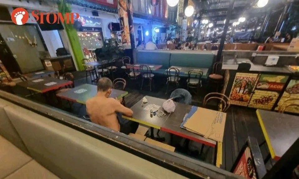 Stomper J shared photos of the shirtless man sitting alone in the Mexican restaurant at 12.30am.