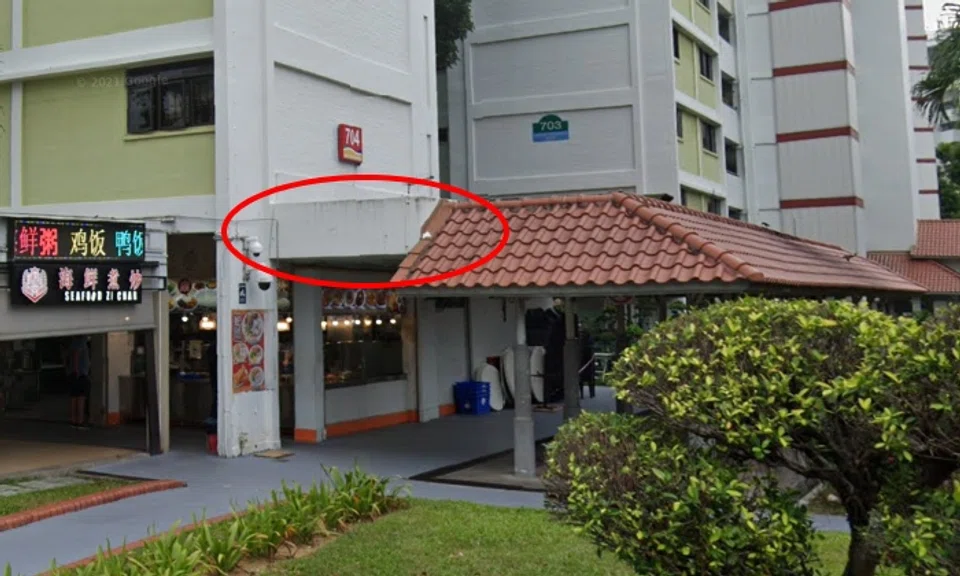 The ledge is surrounded by parapet walls.