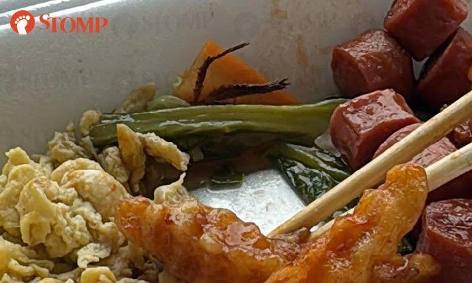 Woman makes 'disturbing discovery' in economy rice from Hougang stall, SFA investigating