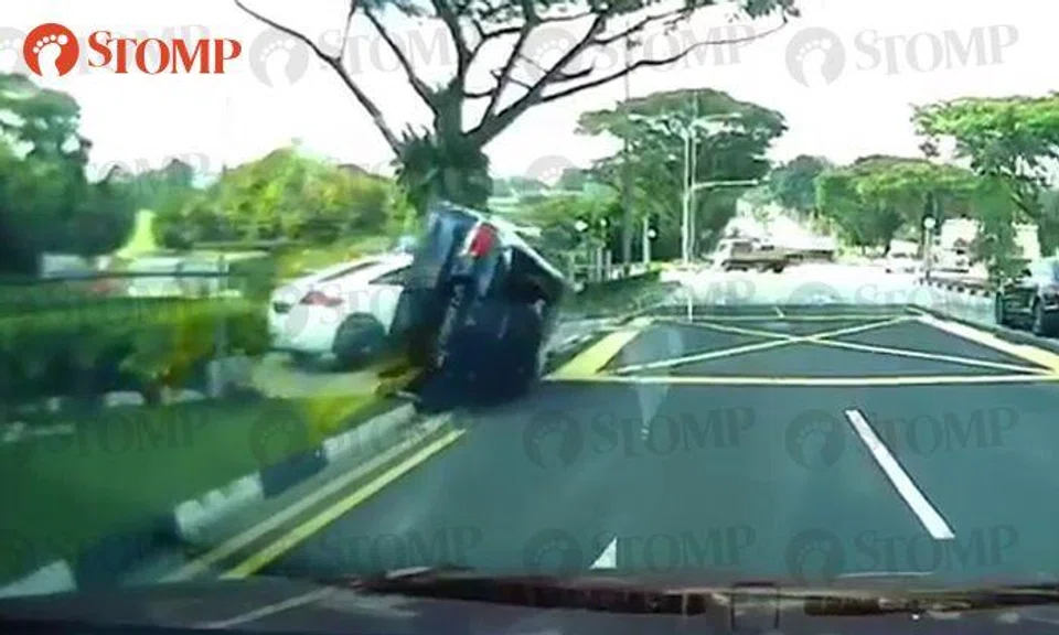 Man shocked to see car overturn in front of him for the first time at Mandai Road