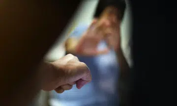 beautician colleague punching jailed fractured nose