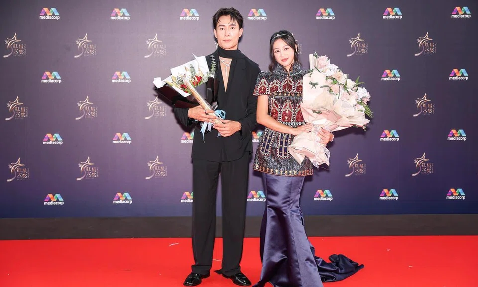 Tasha Low (right) and Tyler Ten (left) on the red carpet at the Star Awards at Mediacorp on April 19. 