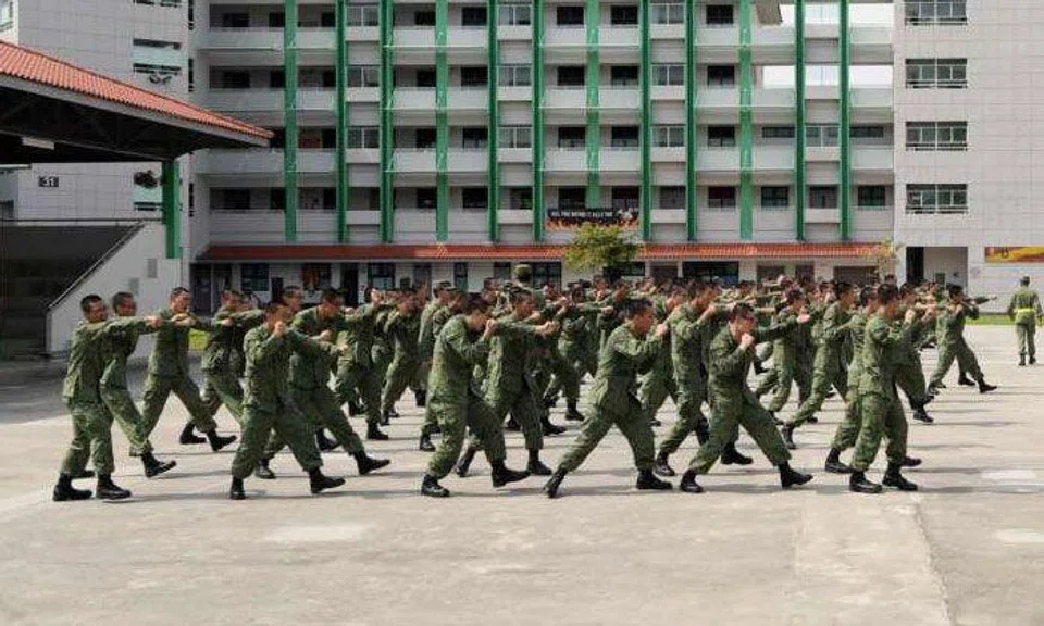 Recruits training in a square at the Basic Military Training Centre on Pulau Tekong. ST PHOTO: ALPHONSUS CHERN