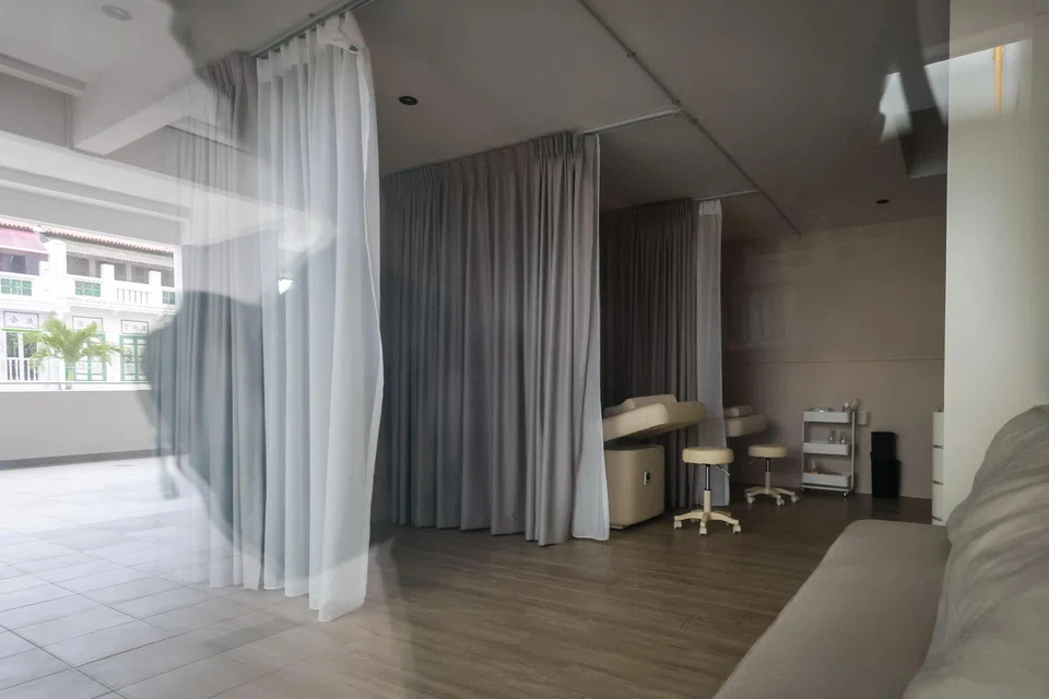 A vacant unit in Tanjong Pagar Plaza that has yet to be cleared out. ST PHOTO: GAVIN FOO