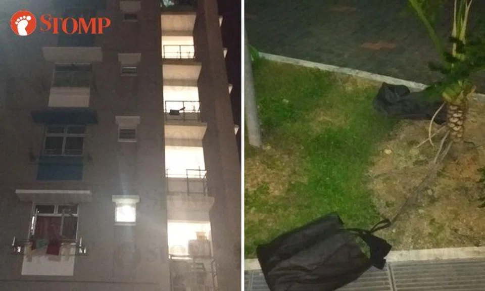 Close shave! Passer-by nearly hit by 3 bags of clothes thrown from Jurong West block