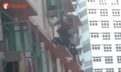 Bukit Batok resident hanging stroller outside kitchen window is an accident waiting to happen