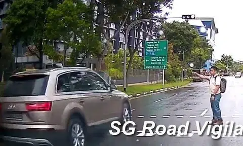 Pedestrian left stunned as Audi runs red light in Tampines