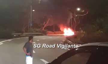 traffic police officers taken to hospital for smoke inhalation after vehicle fire on BKE