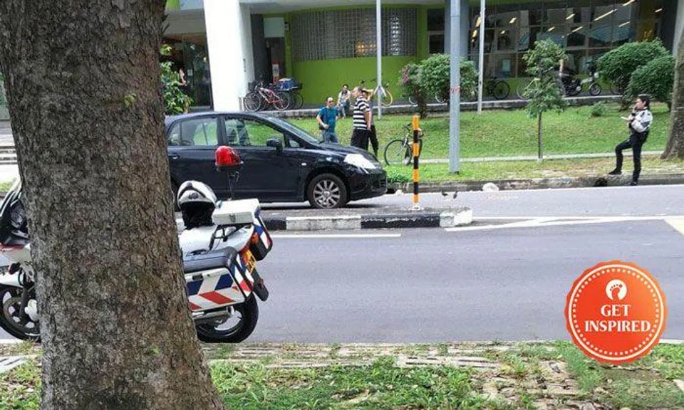 The boy was hit by a car while using a raised zebra crossing in Geylang East Avenue 1. PHOTO: SHIN MIN DAILY NEWS READER