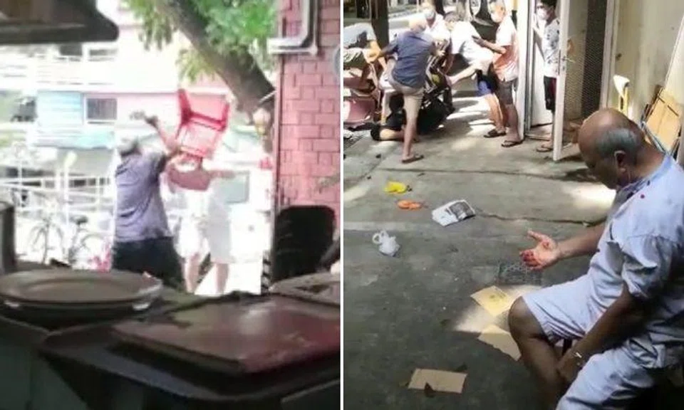 Videos show two men throwing plastic chairs at each other at a coffee shop.