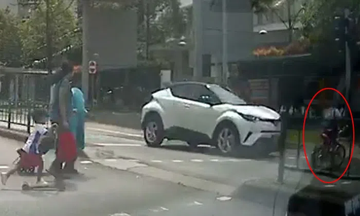 Toyota driver nearly crashes into boy on bike after failing to stop at ...