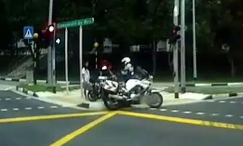 E-bikers stopped by enforcement officer at Commonwealth Ave West