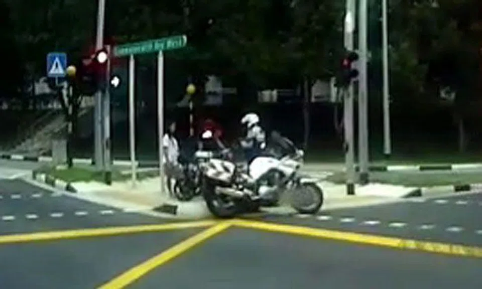E-bikers stopped by enforcement officer at Commonwealth Ave West