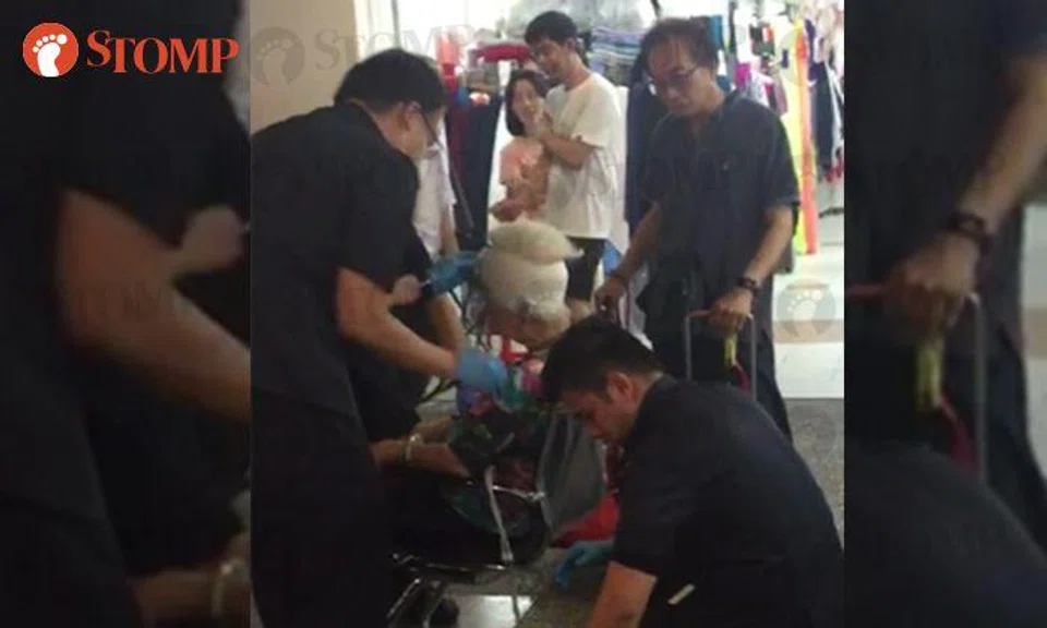 Elderly woman suffers head injuries after falling on escalator at People's Park Complex Food Center