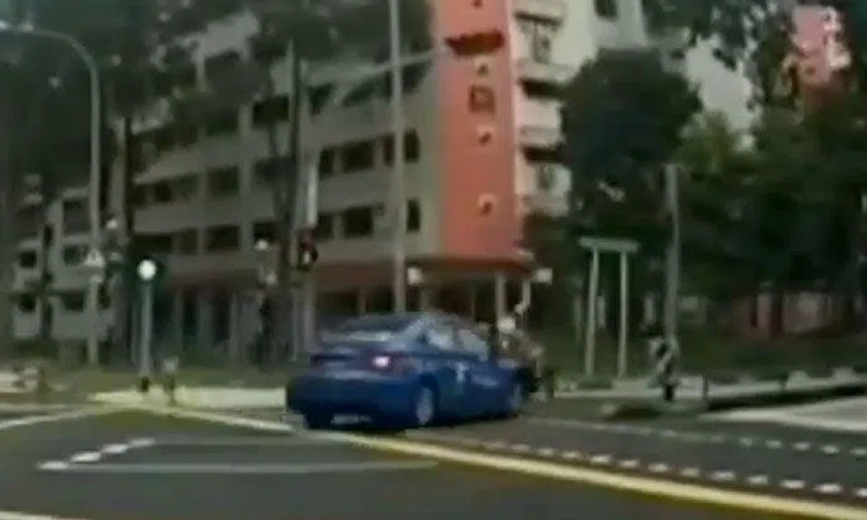 Cyclist, 54, taken to hospital after taxi knocks her off bike at Choa Chu Kang junction