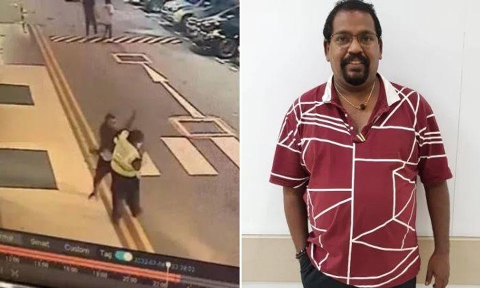  A video showed Mr Sures Perumal being punched and shoved by a man outside the Giant hypermarket at Tampines Retail Park.