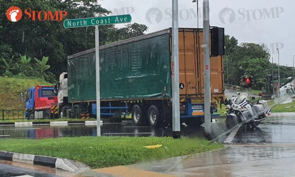 Driver trapped in trailer after accident with lorry at Admiralty Road West junction