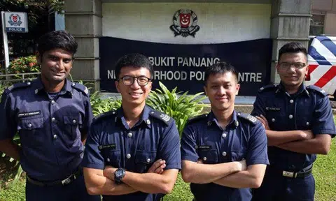 (From left) Sergeant Prem Rengasamy, Staff Sergeant Chan Wai Hong, Staff Sergeant Stanley Koh and Special Constable Corporal Rajdave Singh helped pull a maid dangling off a fifth-storey ledge to safety at Bukit Panjang Ring Road on Dec 6, 2017.ST PHOTO: SEAH KWANG PENG