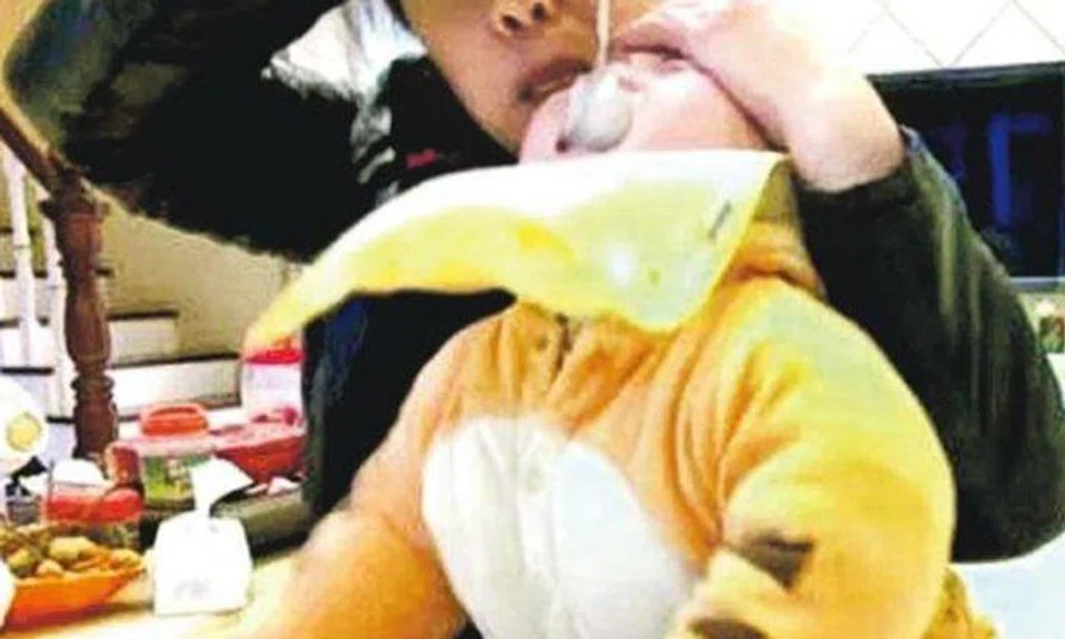 Chinese nanny nearly suffocates 1-year-old boy by force-feeding congee -- due to 'foul mood'