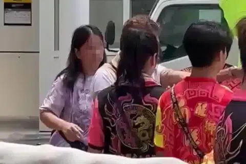 The elderly couple allegedly disturbed the troupe members and the audience at the competition. 