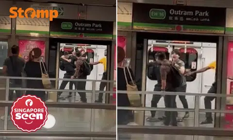 Man shouts vulgarity, restrained by passengers from attacking another on train at Outram MRT station