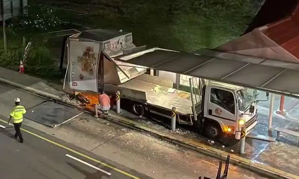 Lorry crashes into bus stop at Lower Delta Road