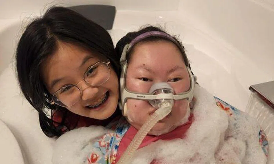 Teen switched to home-schooling to care for bedridden sister after life-threatening episode