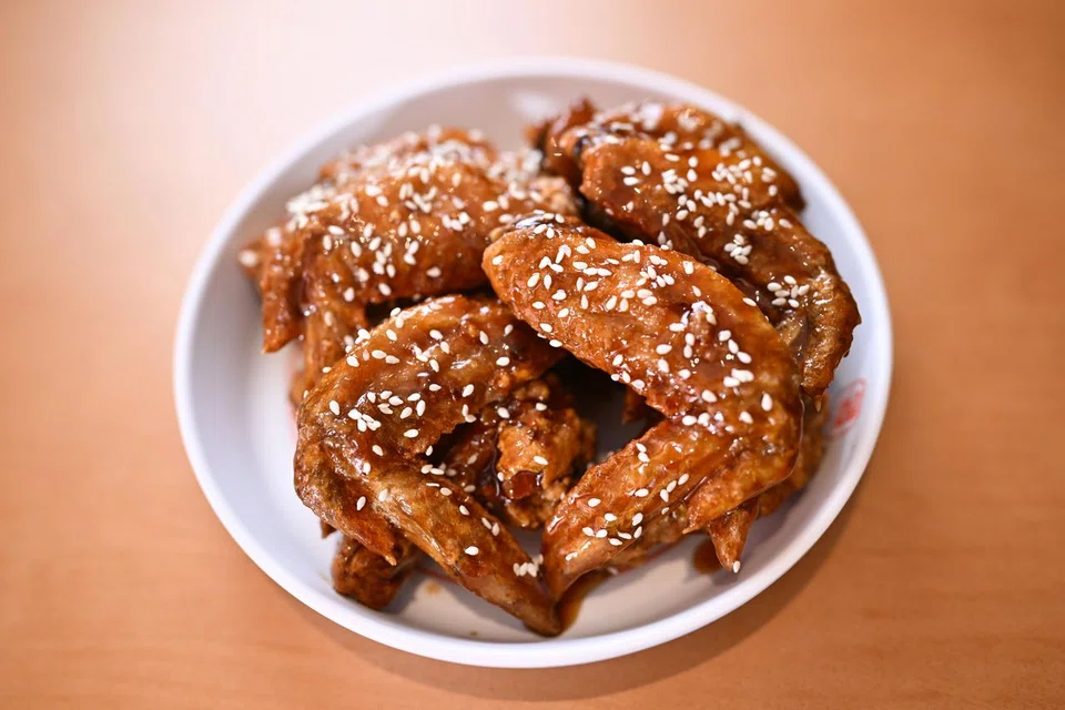 Jinjja Signature Wings with soy garlic sauce.