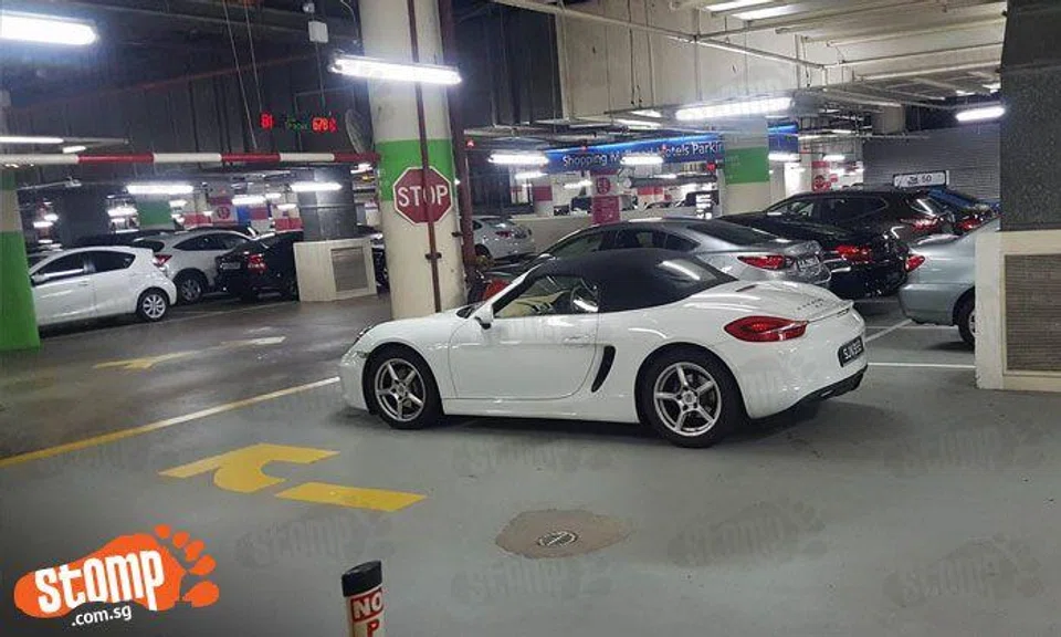 Round of applause for this Porsche driver's fantastic parking skills at Marina Square carpark
