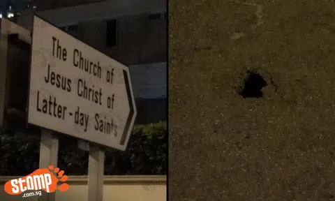 Hole appears in road along Bukit Timah Rd